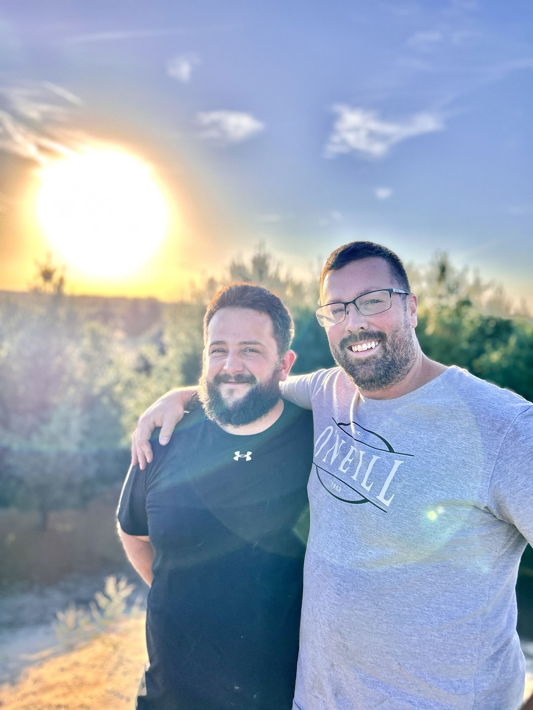 FORGED brothers at the 2025 men's retreat, sunset