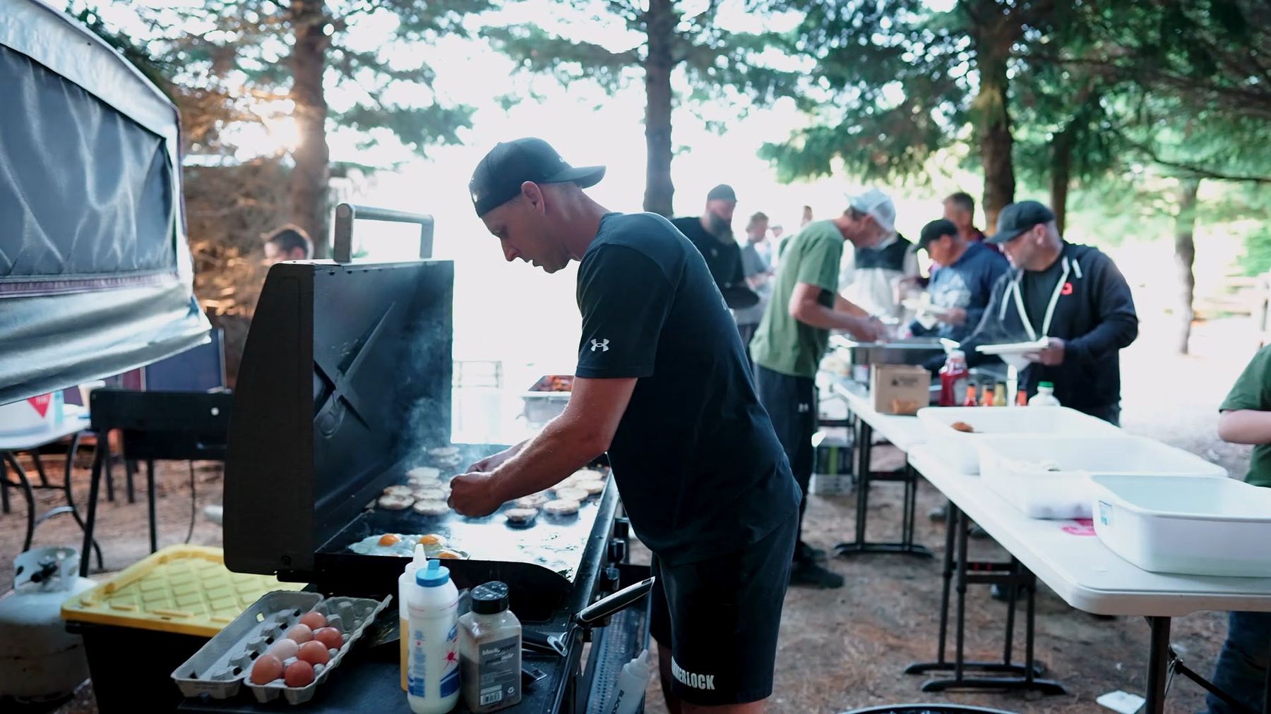 Dan and Greg cooking at the 2025 FORGED Men's Retreat