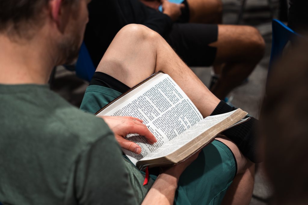 Men studying Scripture together at Forged 27:17