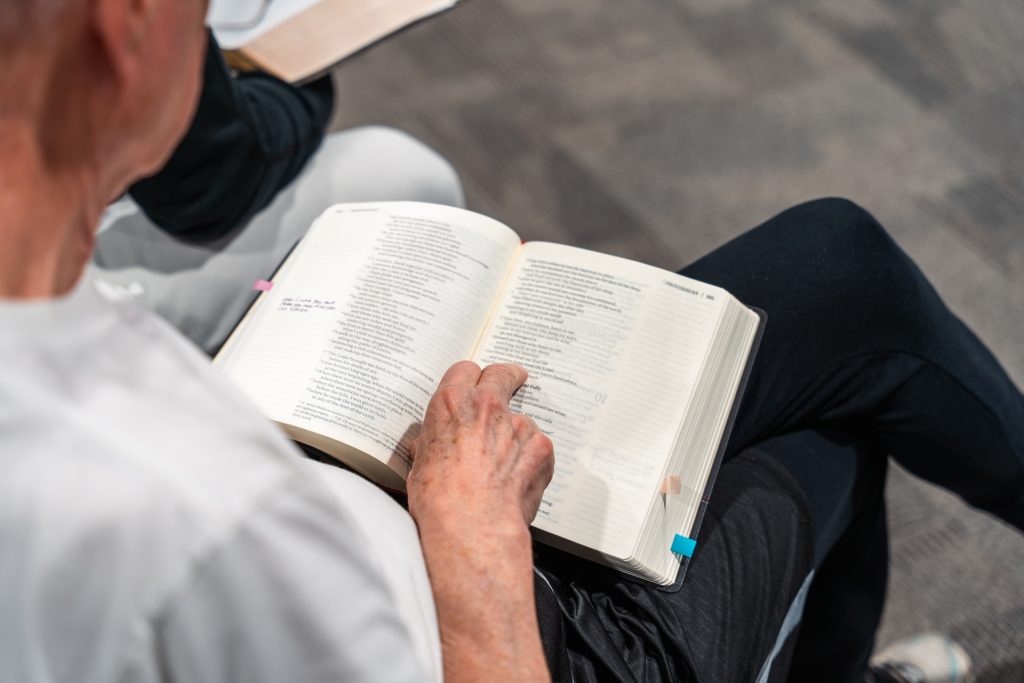 Men studying Scripture together at Forged 27:17